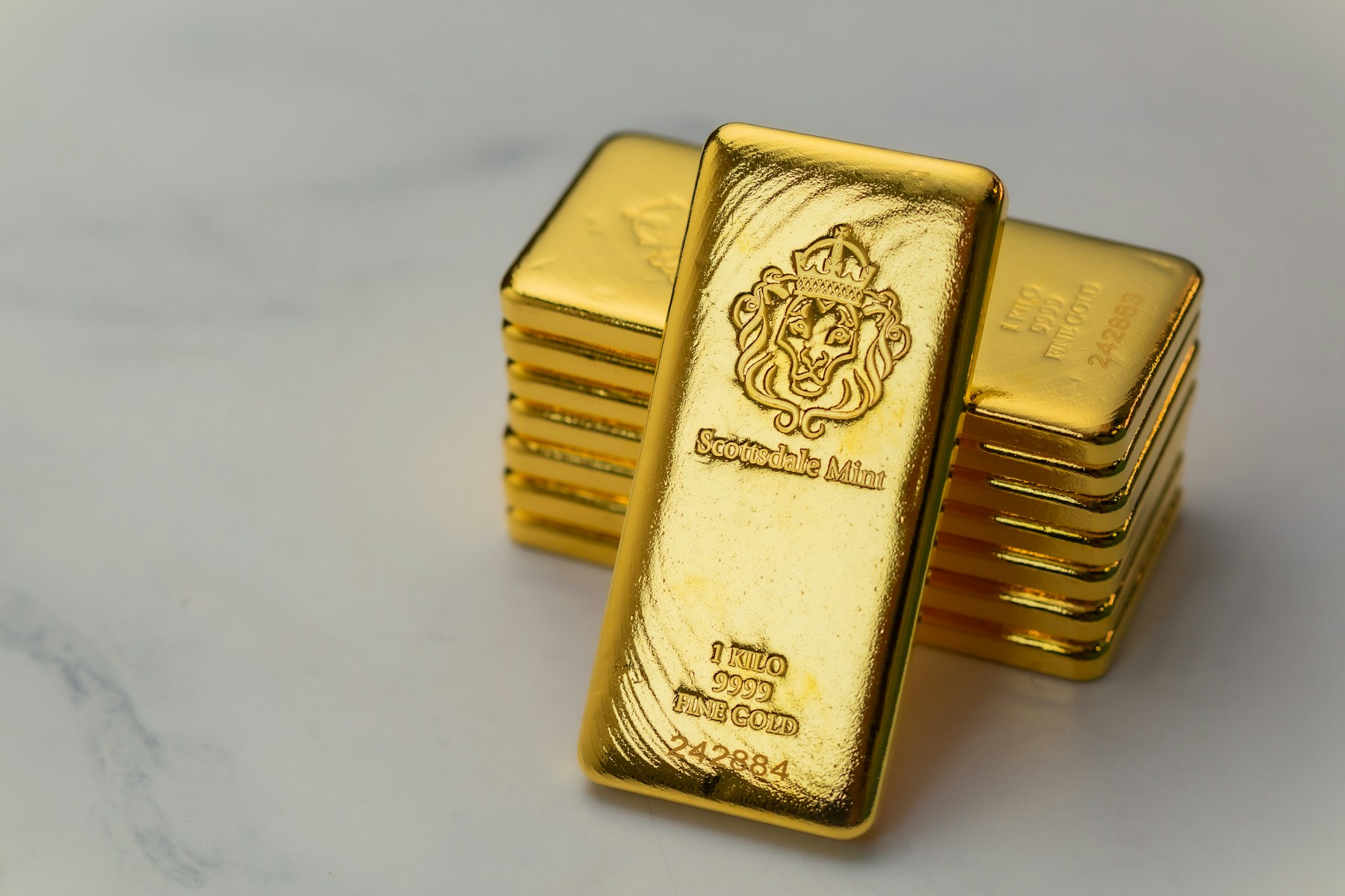 Cast bullion bars stacked together
